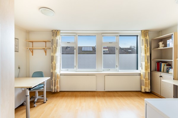 Foto - Te koop: tussenwoning gelegen aan groenvoorziening